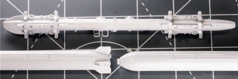 Eduard's MER with lengthening shims, aligned with two Rockeyes