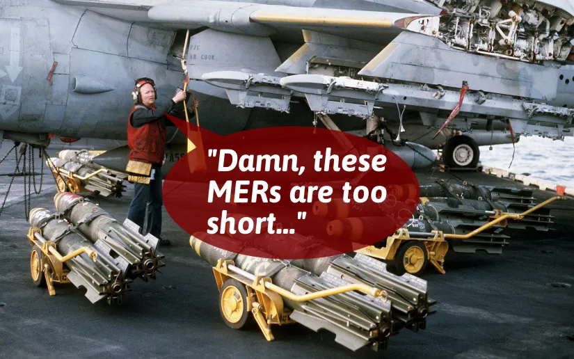 Ordnance technician loading an A-6 Intruder
